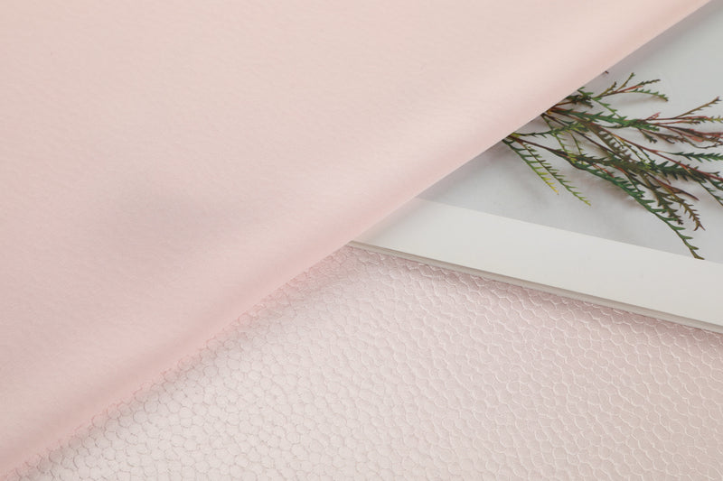 Polka dot embossed satin fabric, 185 g/m² woven polyester, suitable for elegant women's clothing.